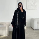 ABAYA Flowy embroidered sleeves with floral vine detailing.